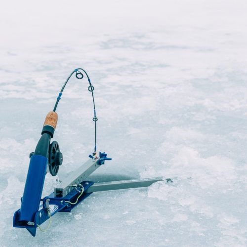 Scenic winter ice fishing in the mountains of Colorado